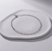 Arcus - Chaines de cheville Signé Flore